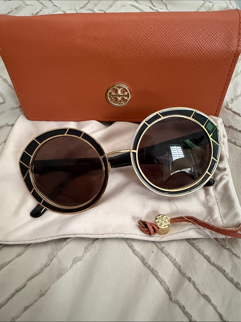 Tory Burch Black Round Sunglasses with Gold Trim and Orange Case